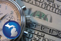 michigan map icon and hourly payroll symbols - a stopwatch and paper money