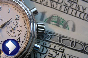 hourly payroll symbols - a stopwatch and paper money - with Washington, DC icon